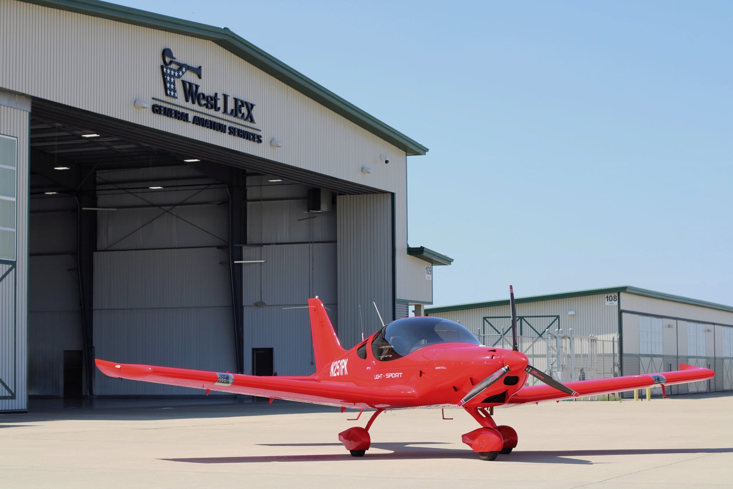 Red Bristell training aircraft at WestLEX, Blue Grass Airport